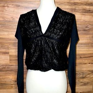 Bebe Woman’s black shiny blouse size S